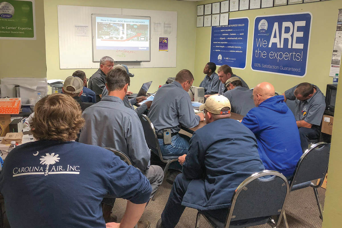 Training R Carolina Air hvac technicians attending professional training